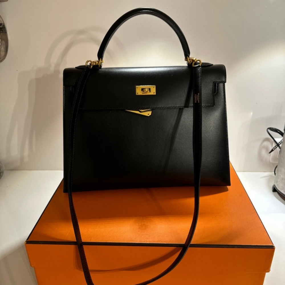 Hermes Kelly 32cm leather handbag with cleaning bill